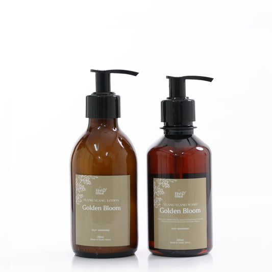 Two bottles of 'Golden Bloom' with pump dispensers on a white background